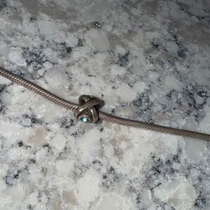 X Pandora bead with turquoise accent stone